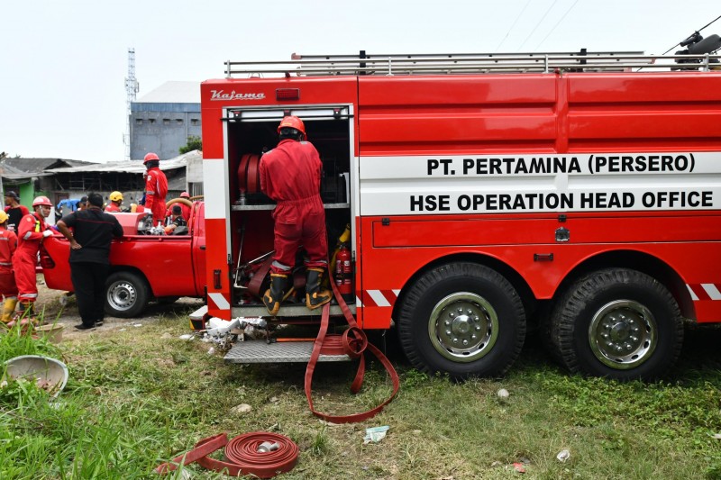 Relawan Pertamina Bantu Pembersihan dan Cek Kesehatan Korban Banjir di Bekasi