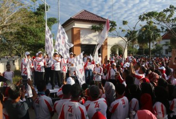 Ribuan Warga Antusias Ikuti Jalan Sehat ‘BUMN Hadir Untuk Negeri’ di Pulau Buru